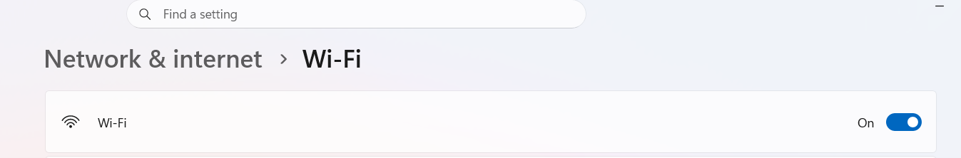 Windows 11 Settings showing Wi-Fi switched on.