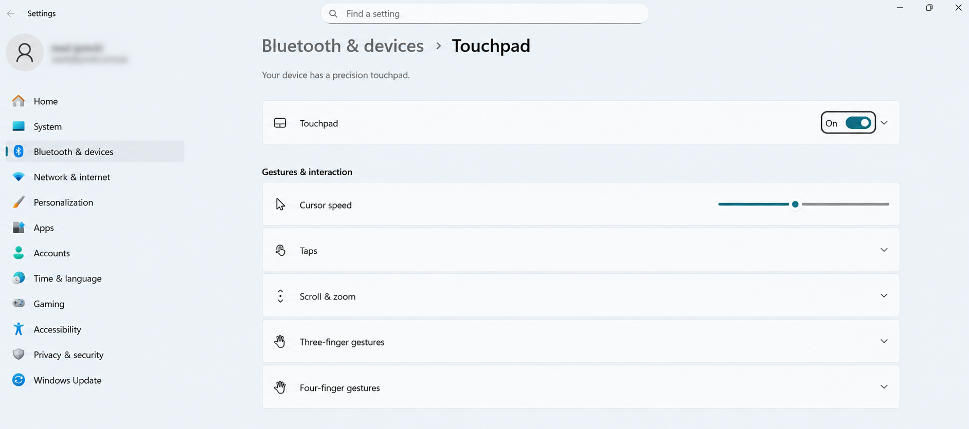 Windows 11 Touchpad settings showing the enabled touchpad toggle to help fix a missing mouse cursor.