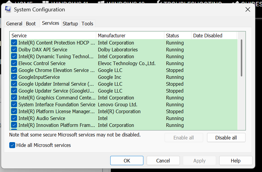 The image shows the System Configuration window on Windows 11, specifically the Services tab. It shows a list of services with columns for Service, Manufacturer including their Status, Running or Stopped, and Date Disabled. Several Intel and Google services are listed. The options Enable all, Disable all, and buttons for OK, Cancel, Apply, and Help are visible at the bottom, along with a checkbox for Hide all Microsoft services.