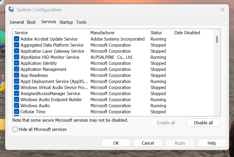 Now, under the Services Tab, check on Hide All Microsoft Services. Click on Disable all. 