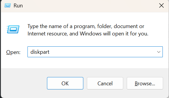 Windows + R, type diskpart
