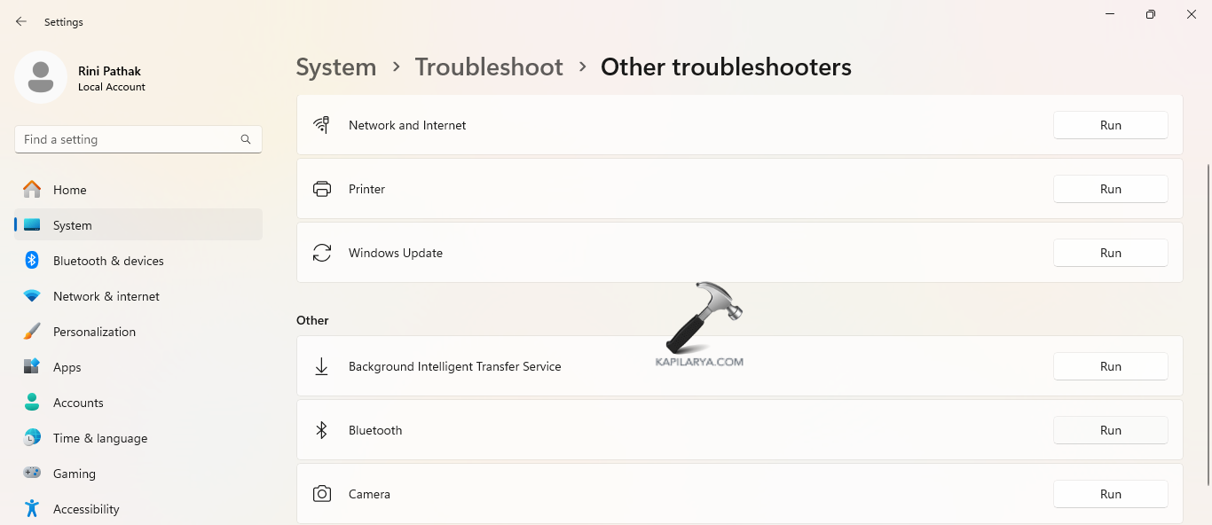 Running Bluetooth troubleshooter for fixing Bluetooth is greyed out on Windows 11/10